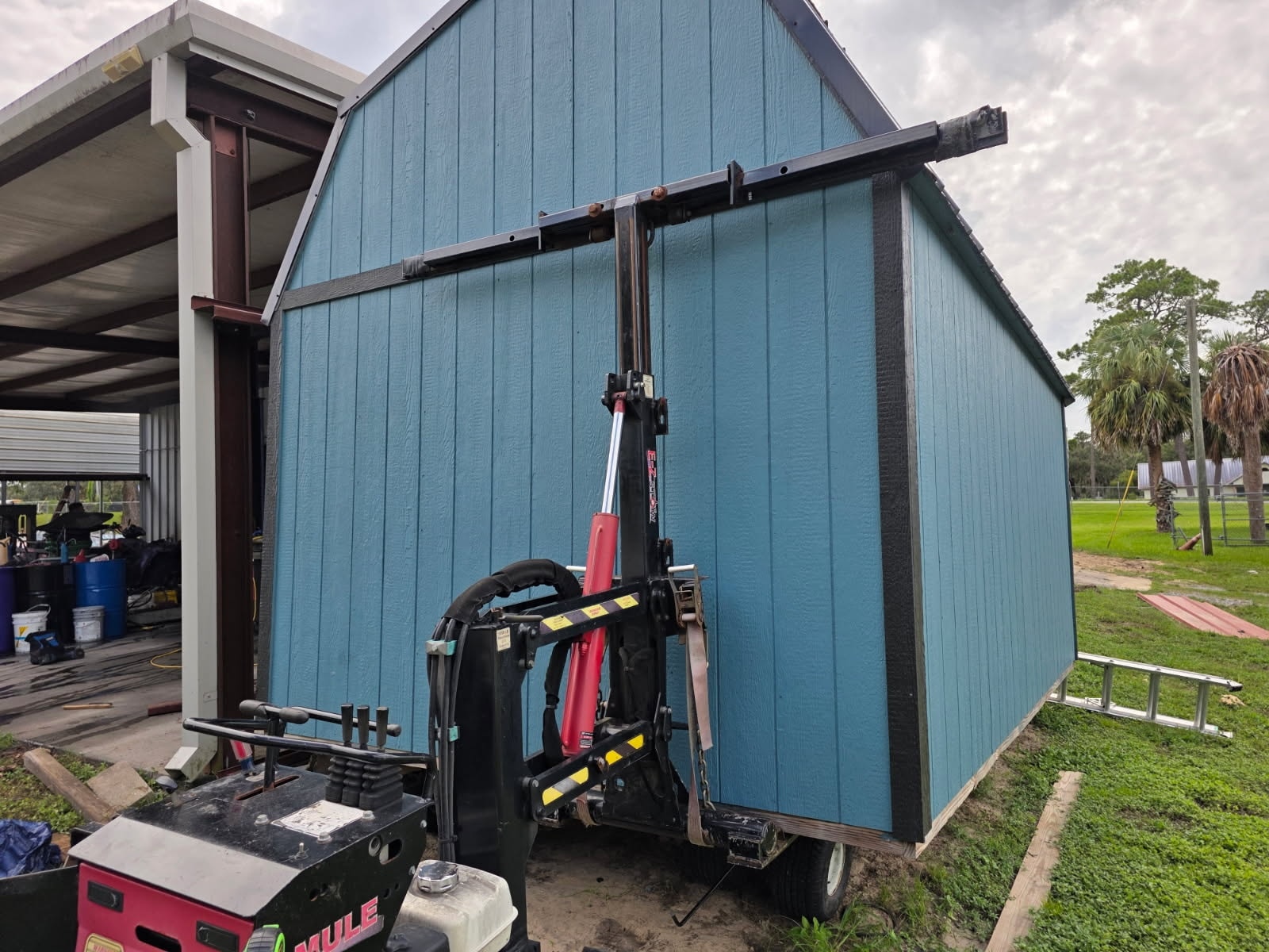 Careful shed releveling setup in Levy County